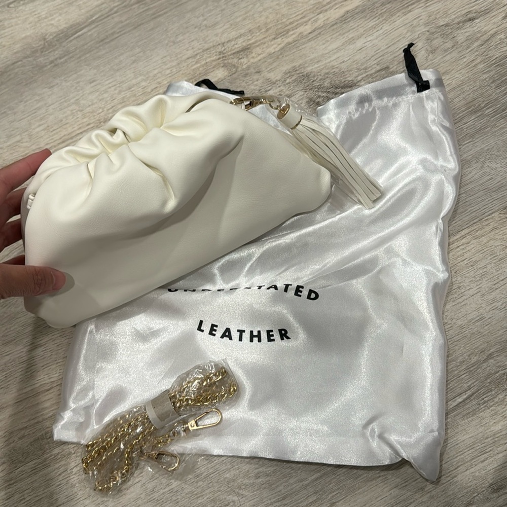 UNDERSTATED LEATHER Crescent Clutch